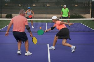 couples playing pickle ball