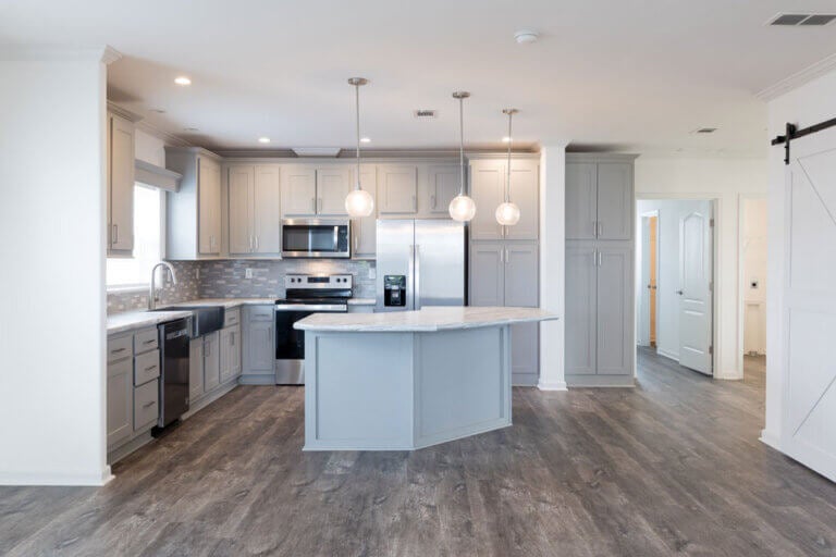 Kitchen inside of a manufactured home in Jamaica Bay Village.