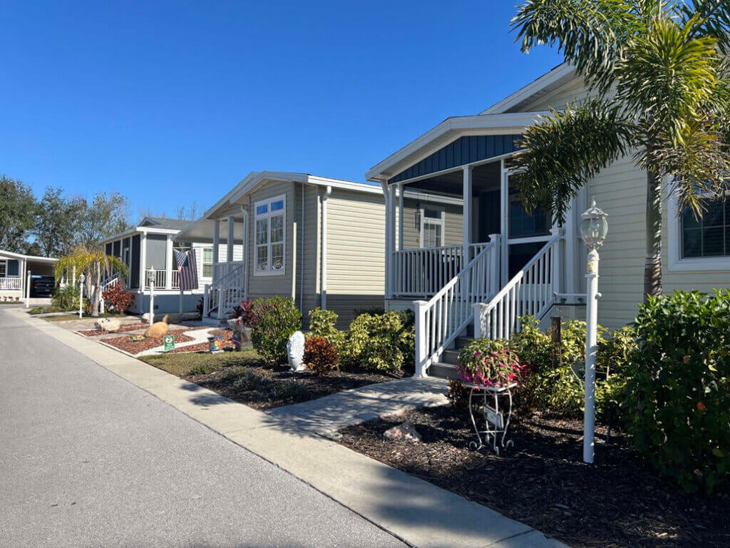 New manufactured homes along a street in The Meadows.