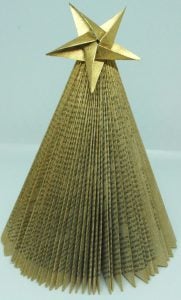 Christmas tree made of book pages, painted gold with a gold star on top