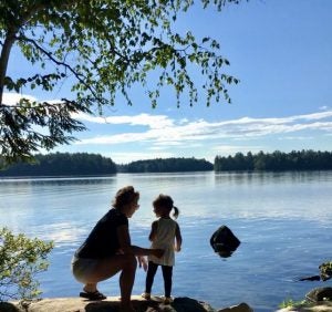 Young child sees Sebago Lake beauty for first time.