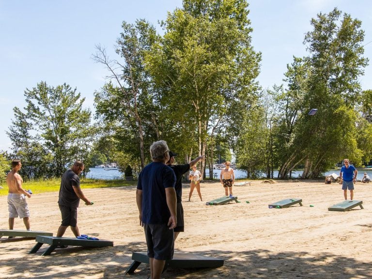 Playing cornhole at Point Sebago RV Park & Resort