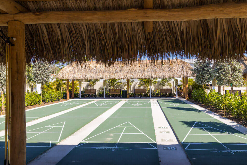 View under tiki hut of the shuffleboard courts at Blueway RV Park in Fort Myers, FL.