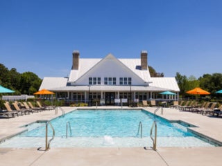 Swimming pool and welcome center at CreekFire RV Park in Savannah, Georgia.