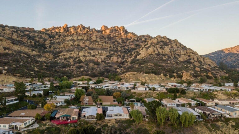 aerial of homes and mountain