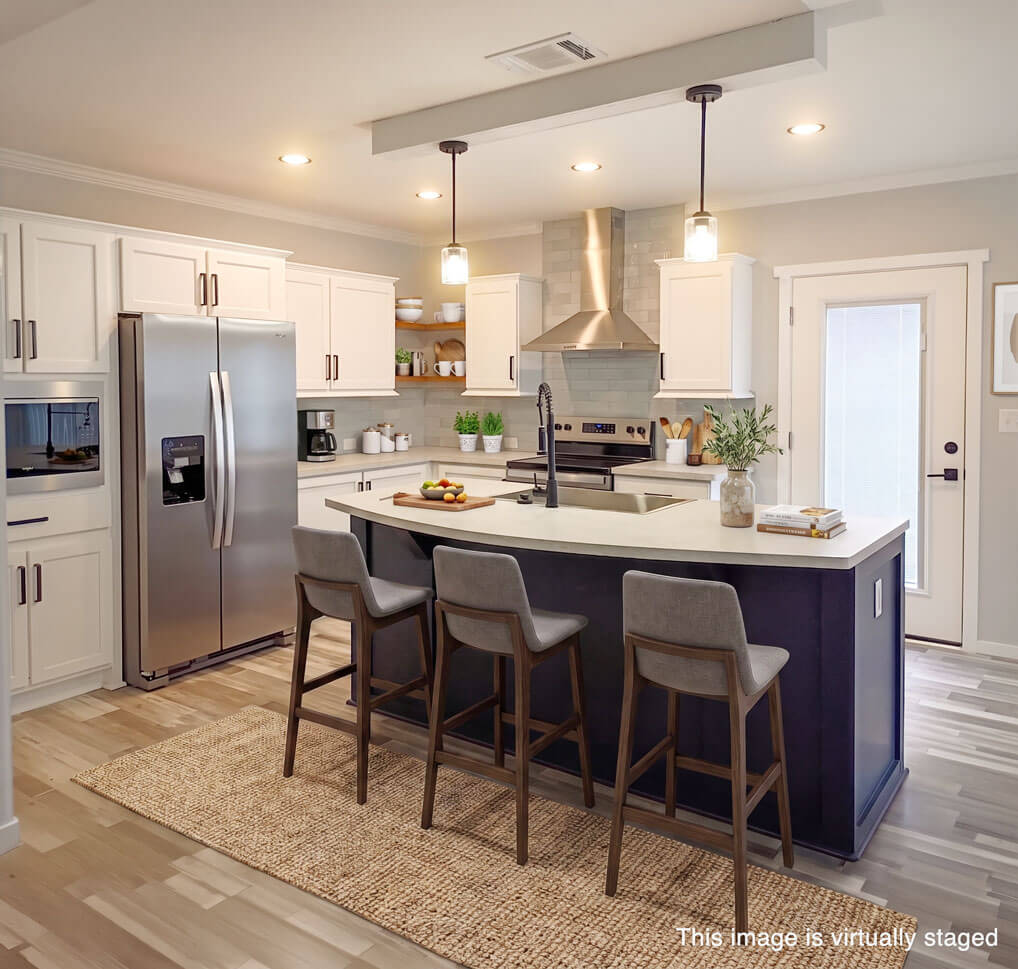 Virtually staged kitchen inside 2238 Common Loon Drive at Cypress lakes Village.