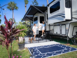 Couple Leaving RV at Blueway RV Park in Fort Myers, Florida.
