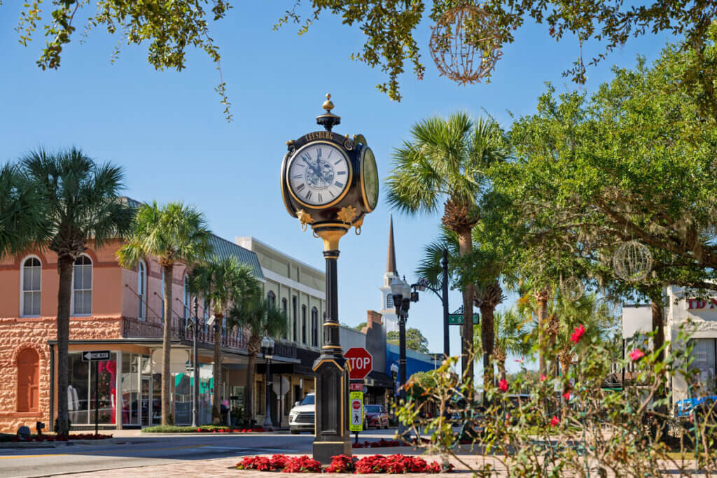 Downtown main street of small town Leesburg, Florida with public clock and steeple by Michael Warren from iStock.
