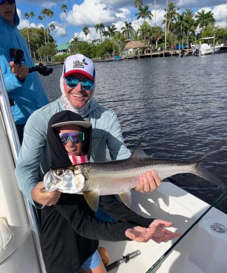 Houston, the Fishing Tournament winner showing off his catch at Chokoloskee RV Park.