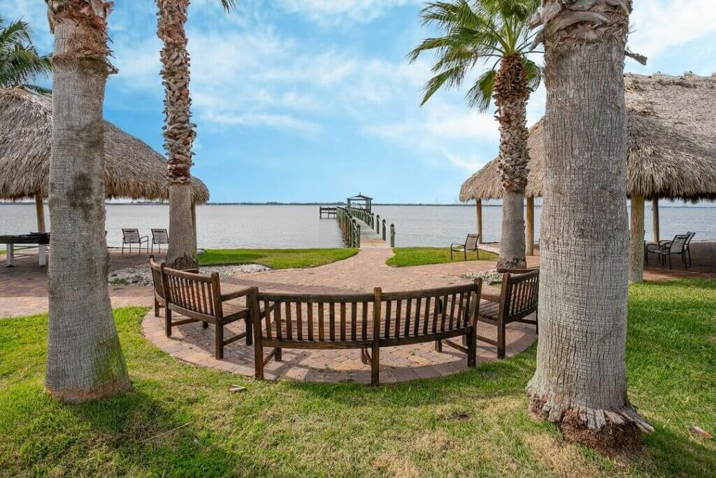 Fire pit and seating area over looking the dock