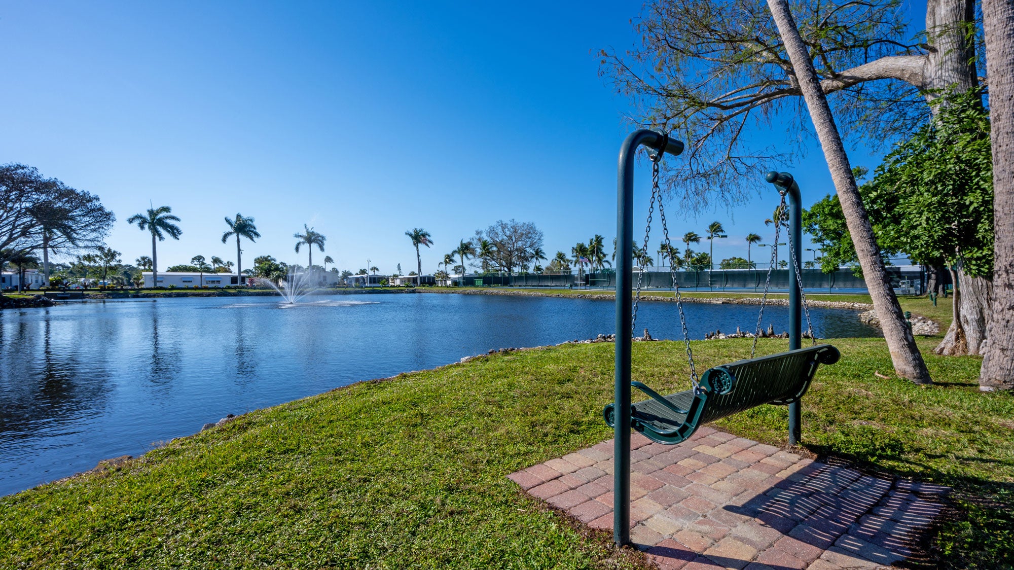 Jamaica Bay Village - view of chair swing by lake