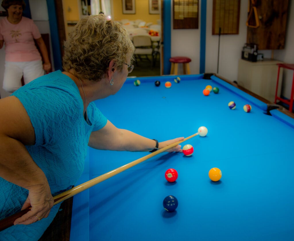 Residents Playing Pool at Lake Griffin Harbor