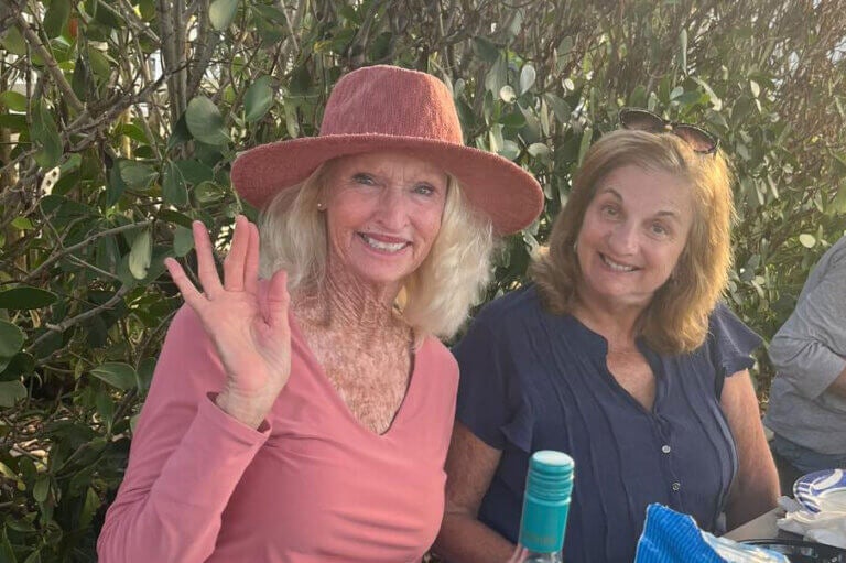 Residents at a potluck party at The Waters in Florida.