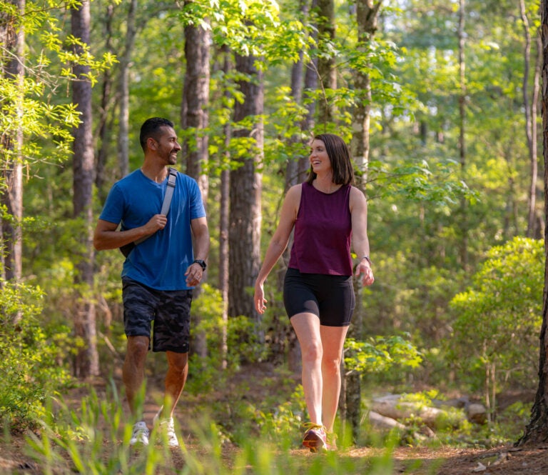 friends walking on nature path lake jasper