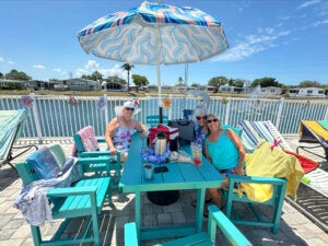Residents on the renovated patio The Meadows in Tarpon Springs, Florida.