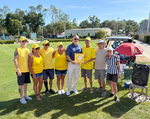 Community Manager and the Whiffle Ball Team Champions at 55+ community, Rolling Greens Village in Ocala, Florida.