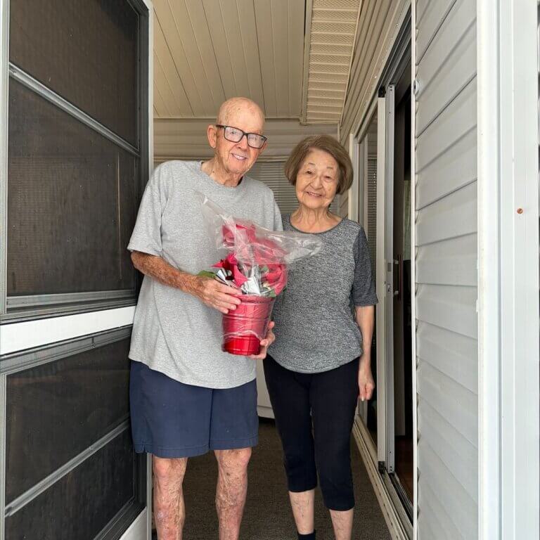Poinsettia delivery to 90+ yr old residents at The Meadows in Tarpon Springs