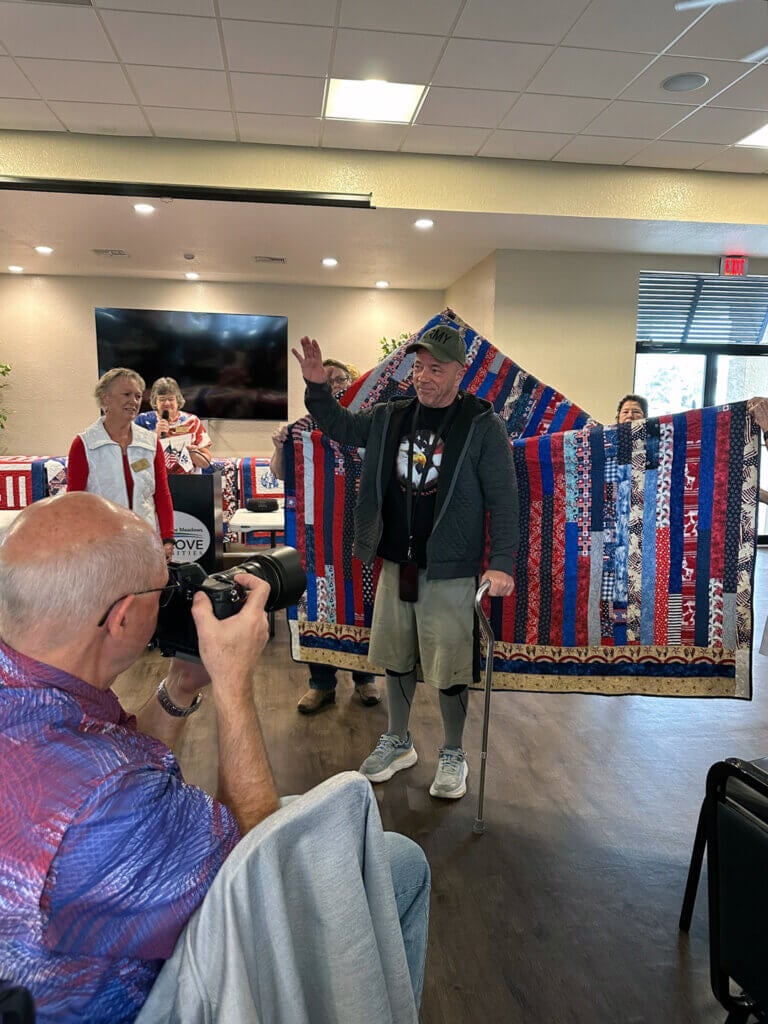 Resident at The Meadows in Tarpon Springs is honored at Quilts of Valor Ceremony for his service.