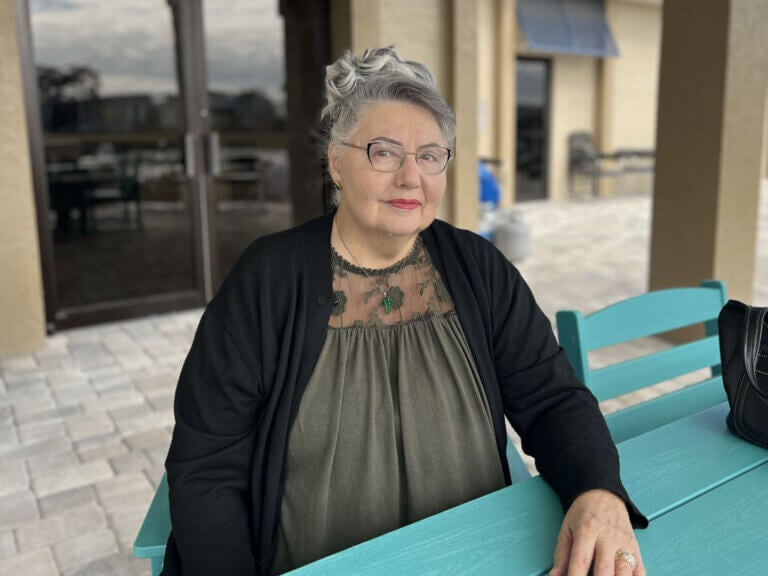 Tricia Baylis, sit on the patio at The Meadows clubhouse in Tarpon Springs, FL