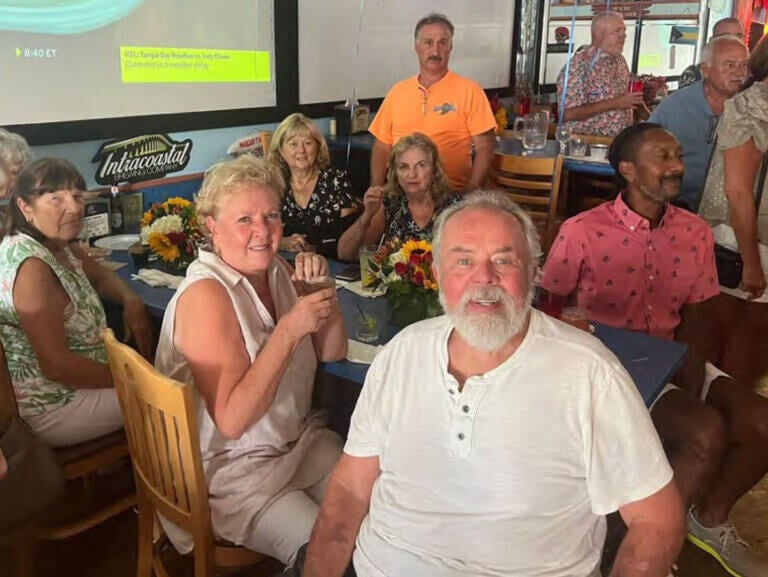 Friends from The Waters celebrating a birthday at a restaurant.