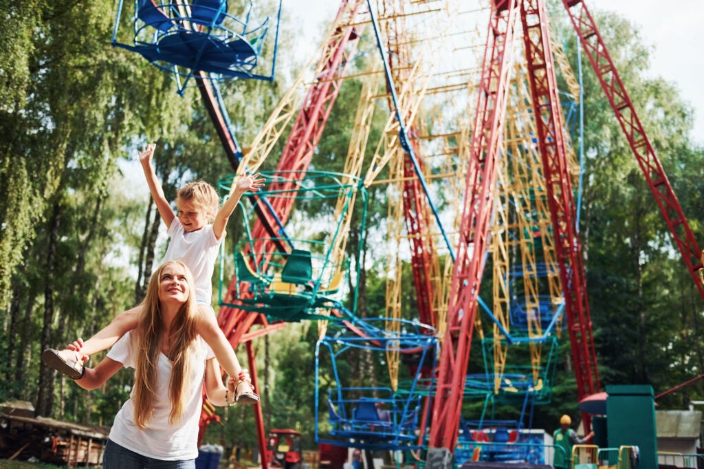 Mother daughter at theme park