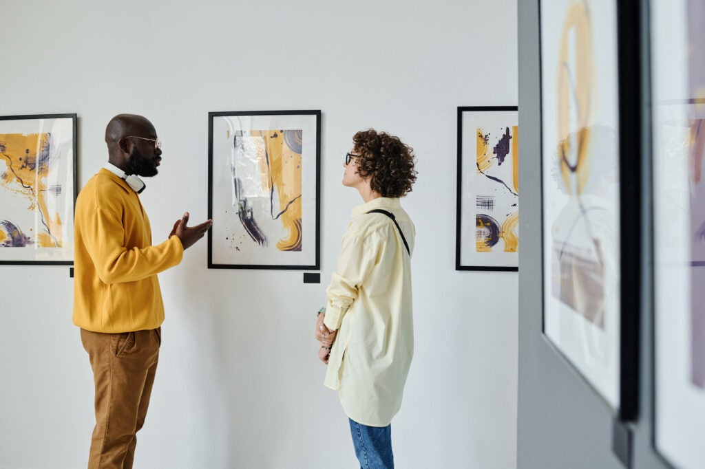 Couple discussing modern art together