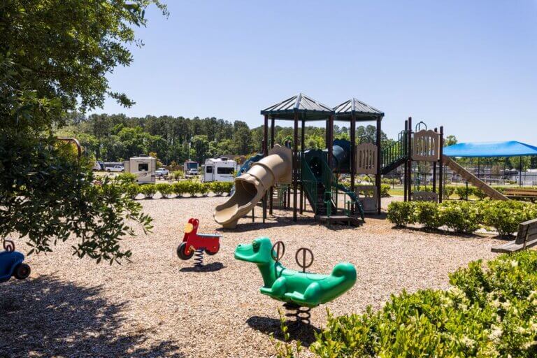 A playground featuring slides at CreekFire RV Resort in Georgia.