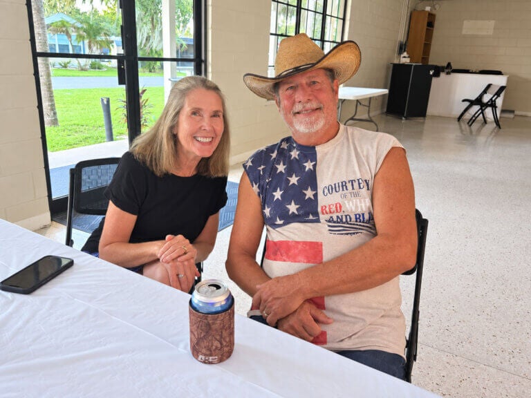 Guests attend a social event in the Activity Center at Holiday RV Park in Leesburg, Florida