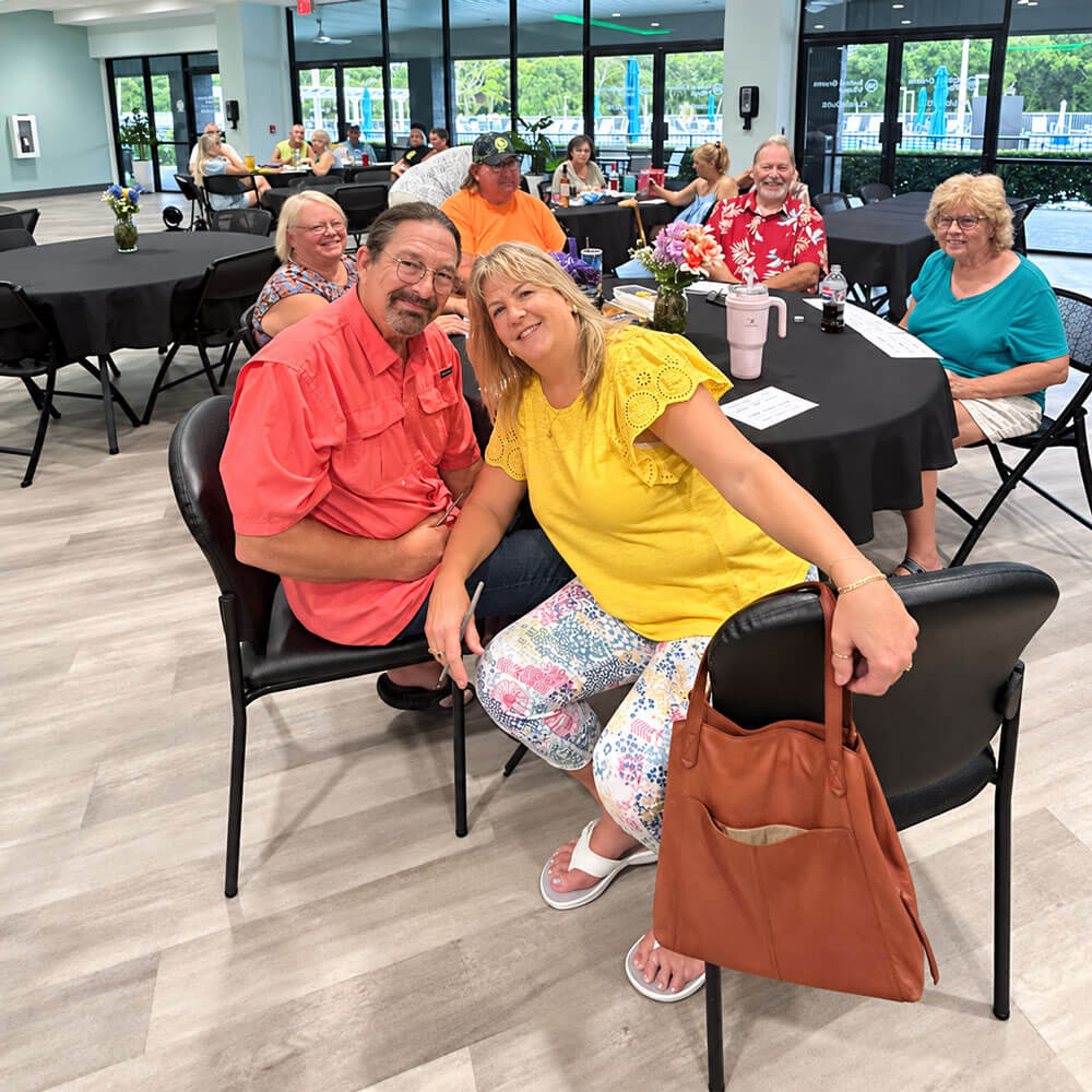 Residents in the main clubhouse at Rolling Greens Village in Ocala, Florida.