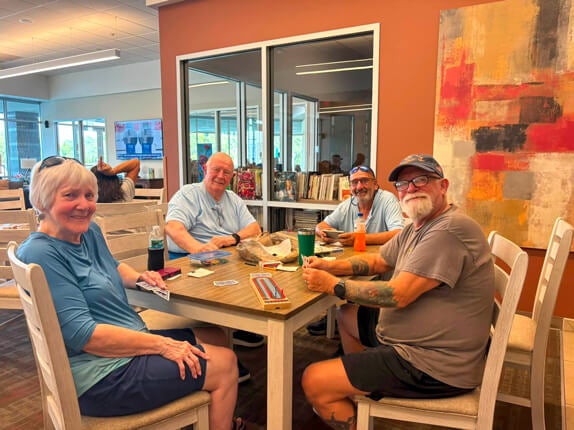 Residents playing Rolling Jokers in the Community Center at Rolling Greens Village in Ocala, Florida.
