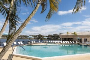 Swimming pool along the lake at Camelot East Village in Sarasota, Florida.