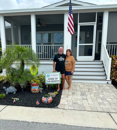 Residents are recognized as the "Home of the Month" at The Meadows in Tarpon Springs, Florida.