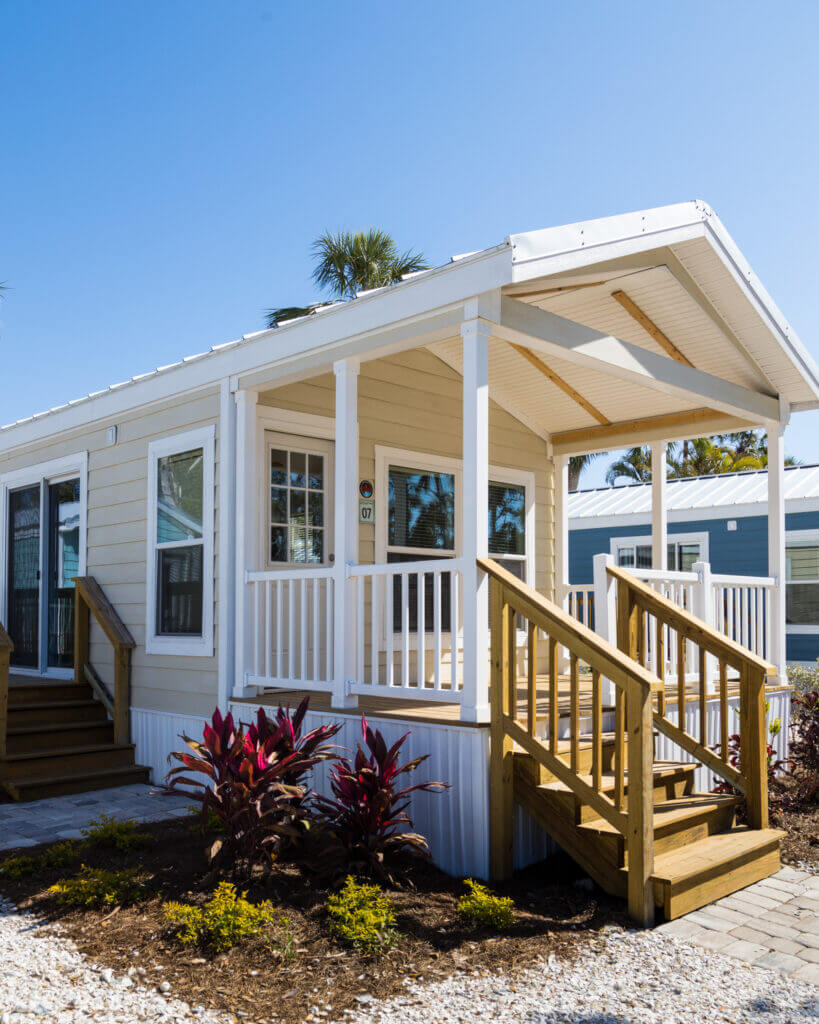 Side view of front porch of a Park Model Cottage For Sale in 2023-24