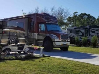 River Vista RV - RVs parked with golf cart