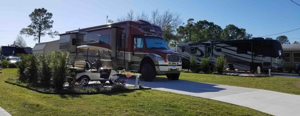 River Vista RV - RVs parked with golf cart