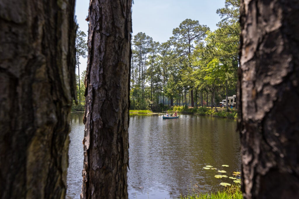 Lake Jasper RV with Couple Canoeing