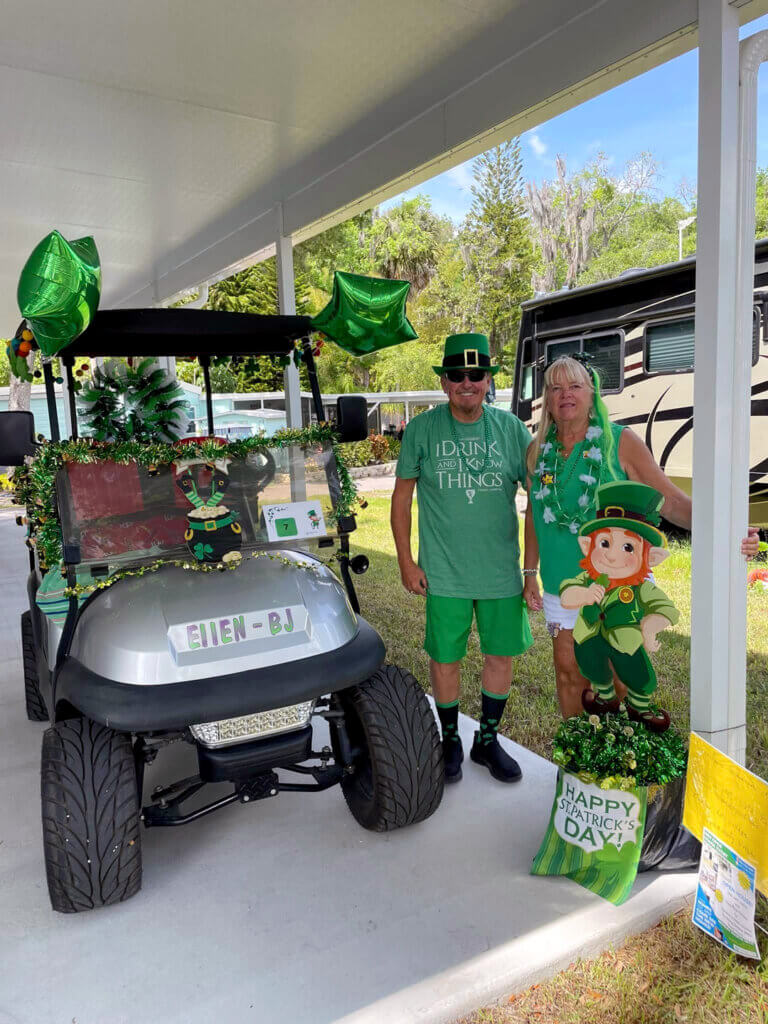 Guests with decorated golf carts for St. Patricks Day Golf Cart Parade at Holiday RV Park in Leesburg, FL.