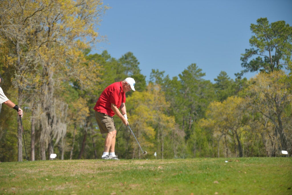 Rolling Greens Village - Man golfing