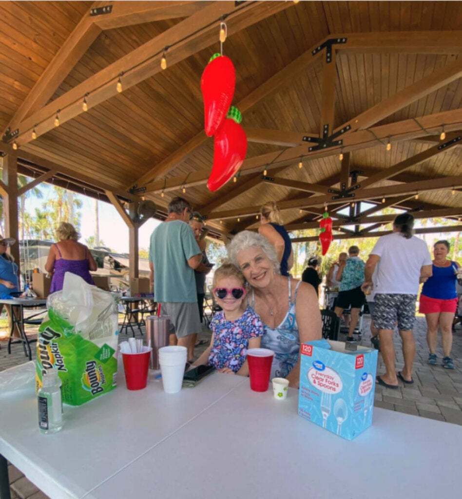 Guests at Blueway RV in the pavilion with Chili Pepper decorations for the chili cook-off