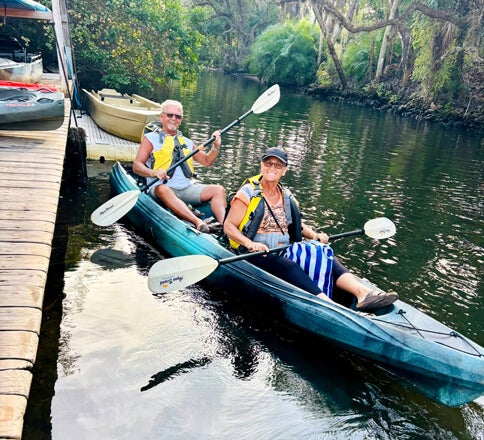 2 Guests from Blueway RV Park in Fort Myers, FL join the group kayaking tour excursion down the Estero River.