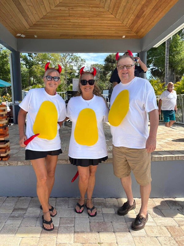 Guests wearing deviled egg costumes at the pool party at Blueway RV Park in Fort Myers, FL.