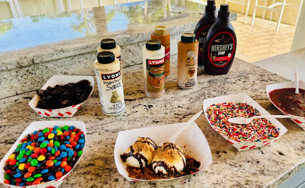 Ice cream toppings laid out on the counter for Blueway Ice Cream Social