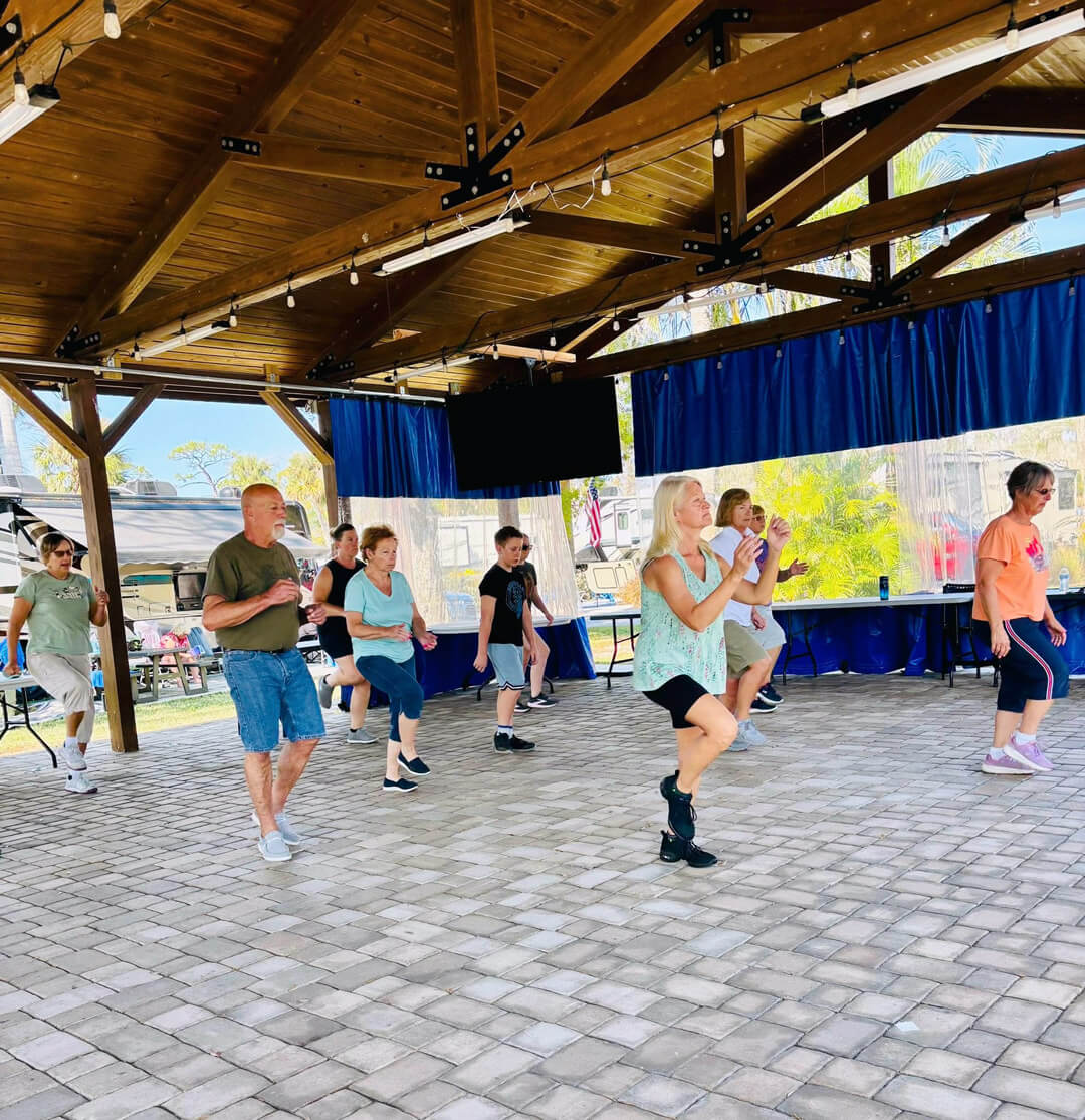 Guests Line Dancing in the Pavilion