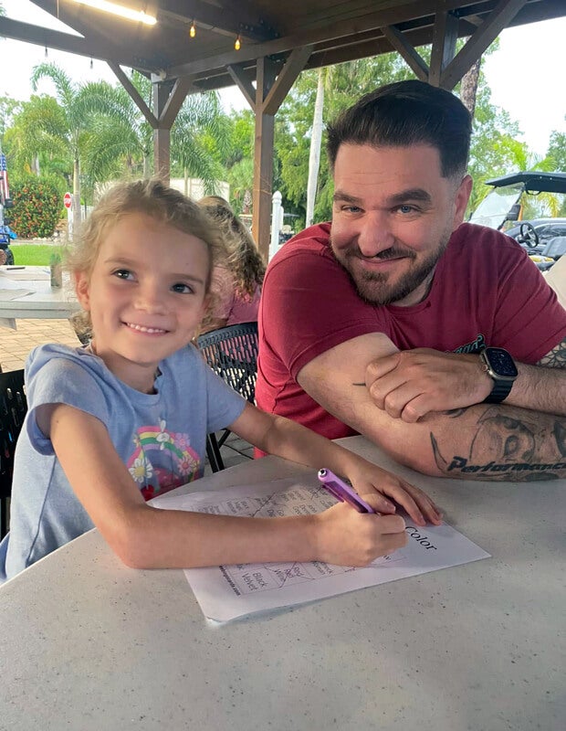 Guests playing music bingo at Blueway RV Park in Fort Myers, FL.