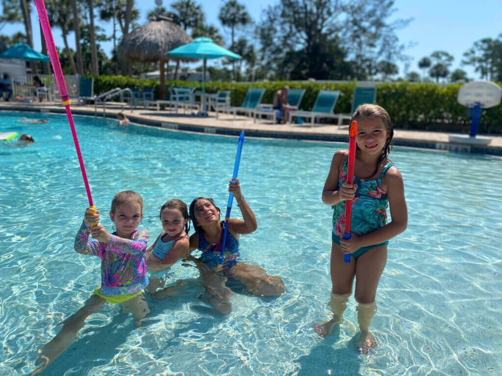 Kids playing in the pool together at Blueway RV