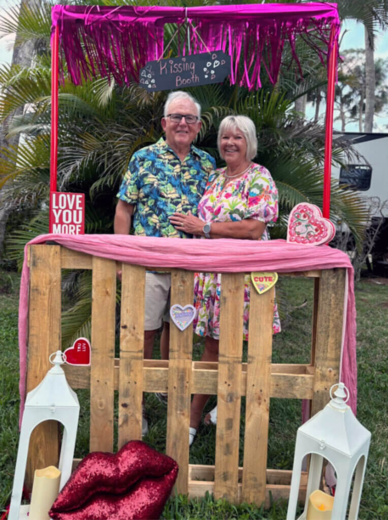 Blueway guests in the kissing booth at the valentines day dinner and dance