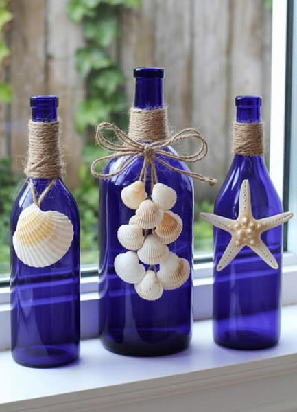 Craft class decorating blue glass bottles with seashells at Holiday RV Park in Leesburg, FL.