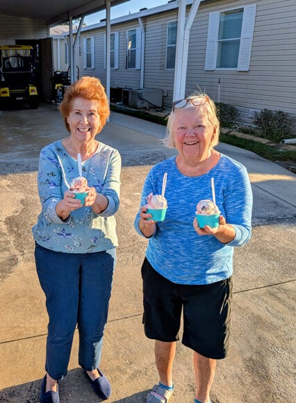 Residents with their ice cream from Peg Leg Ice Cream Truck in Cypress Lakes Village in Lakeland, FL.