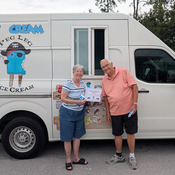 Residents in front of Peg Leg Ice Cream Truck in 55+ Cypress Lakes Village in Lakeland, FL.