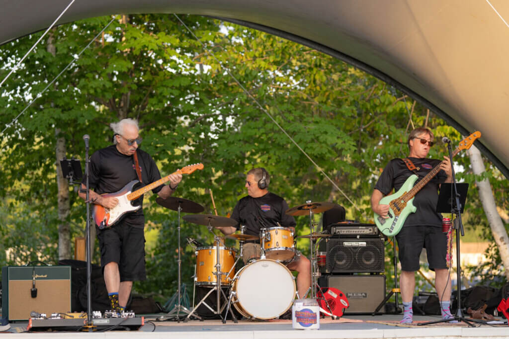 A band playing a beach concert at Point Sebago Resort in Maine.